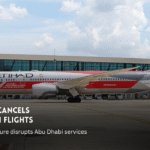 Etihad Airways aircraft at airport after Bahrain flight cancellations.