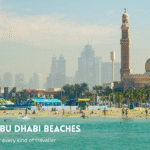 Abu Dhabi beach and mosque skyline.