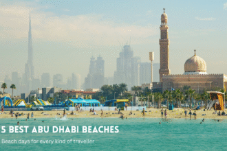 Abu Dhabi beach and mosque skyline.