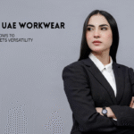 Woman in black blazer and white shirt.