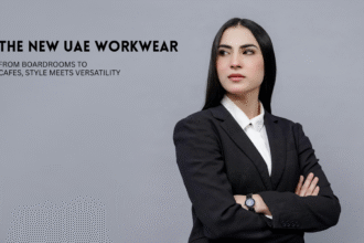 Woman in black blazer and white shirt.