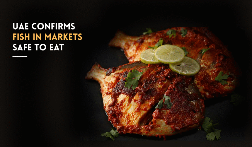 Grilled fish with lemon slices on a plate.